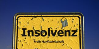 Schild mit Insolvenz Aufschrift.