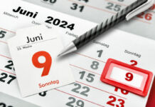 Ein Kalender zeigt den neunten Juni an. Auf dem Kalender liegt ein grau-schwarzer Kugelschreiber. Jemand scheint den kommenden Monat zu planen. Auch ab Juli kommen nun neue Regeln und Maßnahmen auf die Bürger zu.